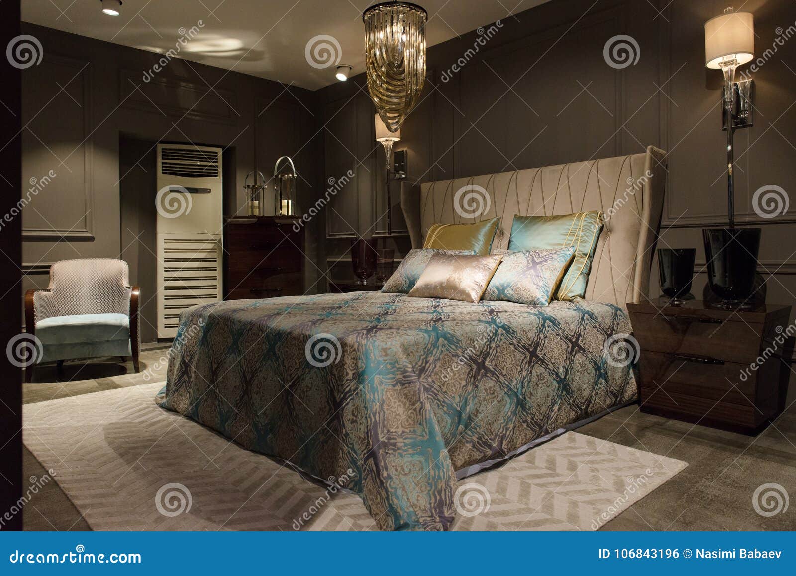 Luxury Bedroom Interior With Carved Wood Bed Dresser And Nights