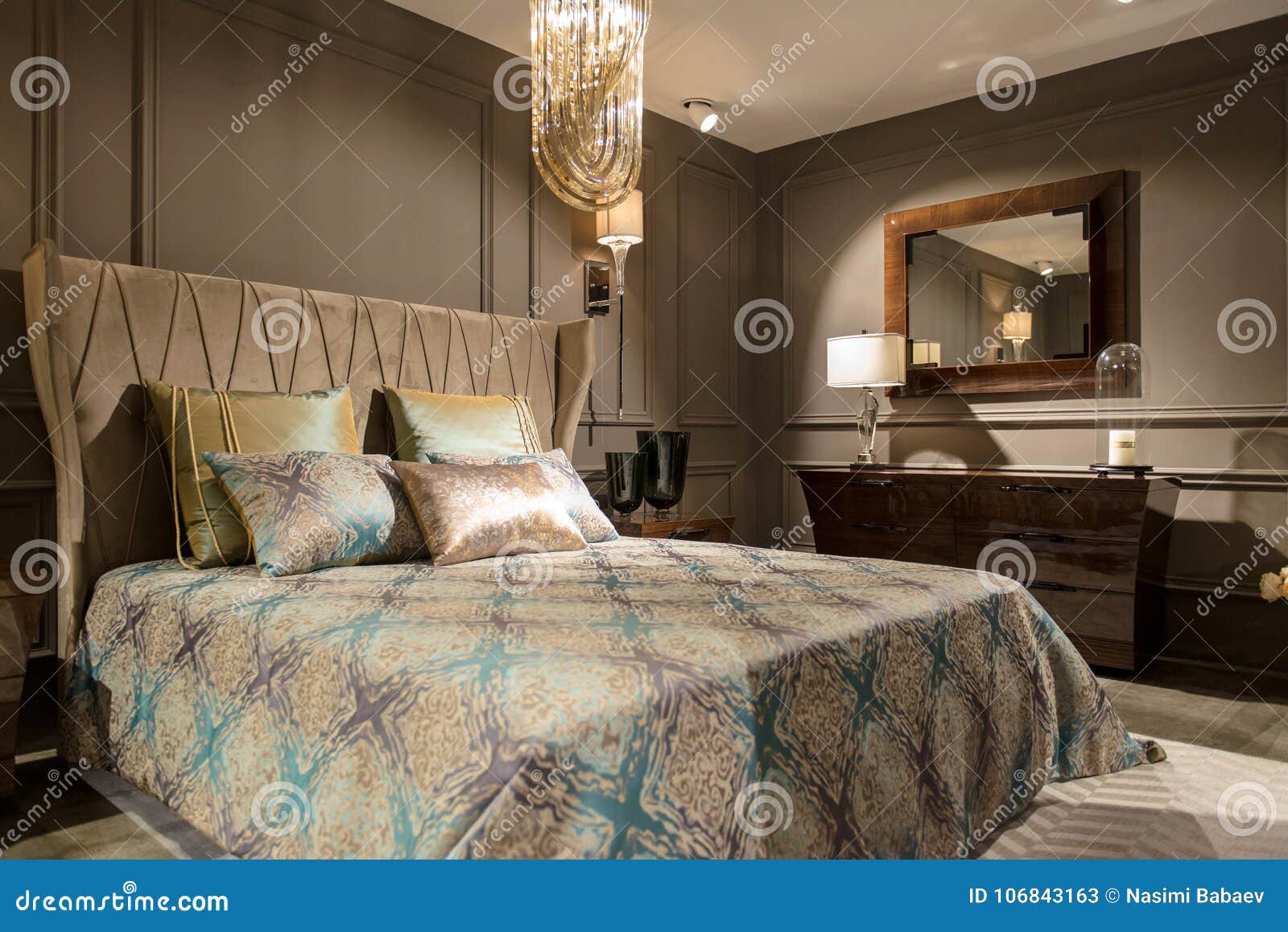 Luxury Bedroom Interior With Carved Wood Bed Dresser And Nights