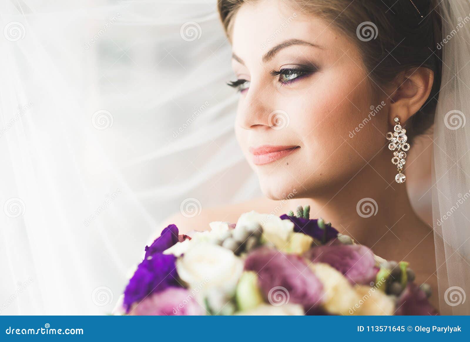 Luxury Bride in White Dress Posing while Preparing for the Wedding ...