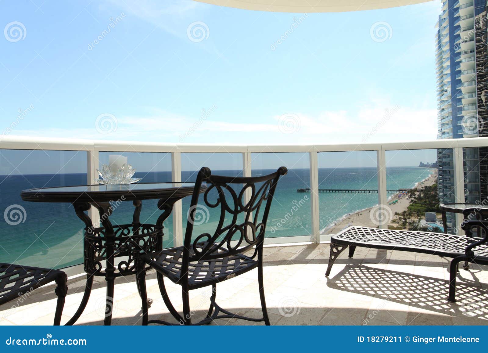 Luxury condo balcony stock image. Image of chair, table 18279211