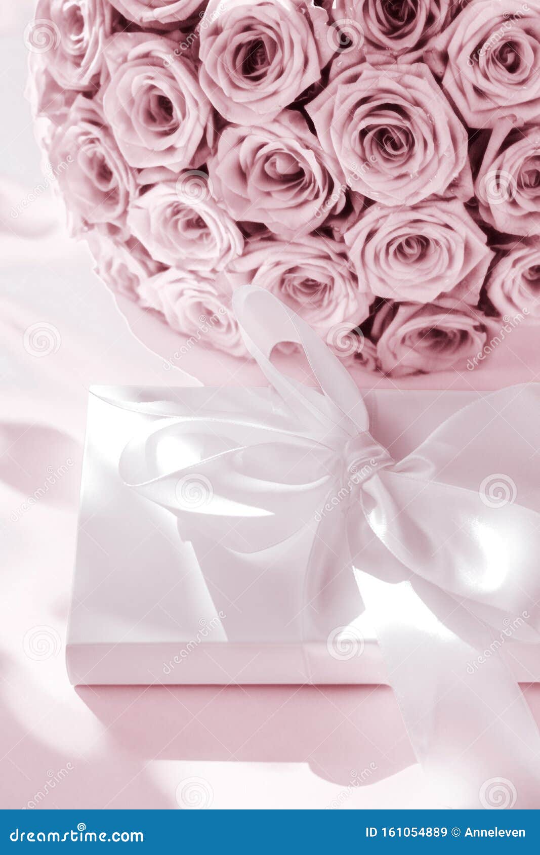 Luxury Holiday Silk Gift Box and Bouquet of Roses on Blush Pink ...