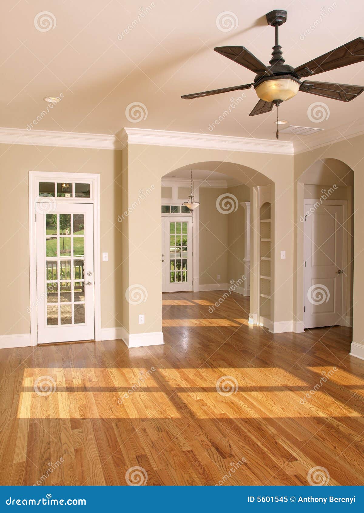 luxury living room with arched opening