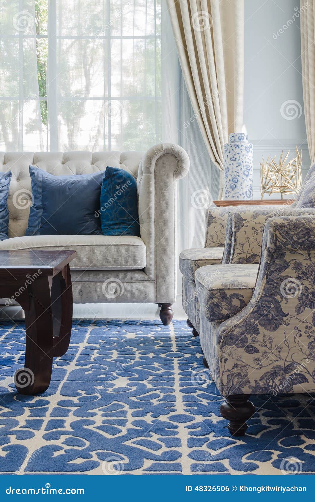 Luxury Living Room with Sofa on Blue Pattern Carpet Stock Photo Image