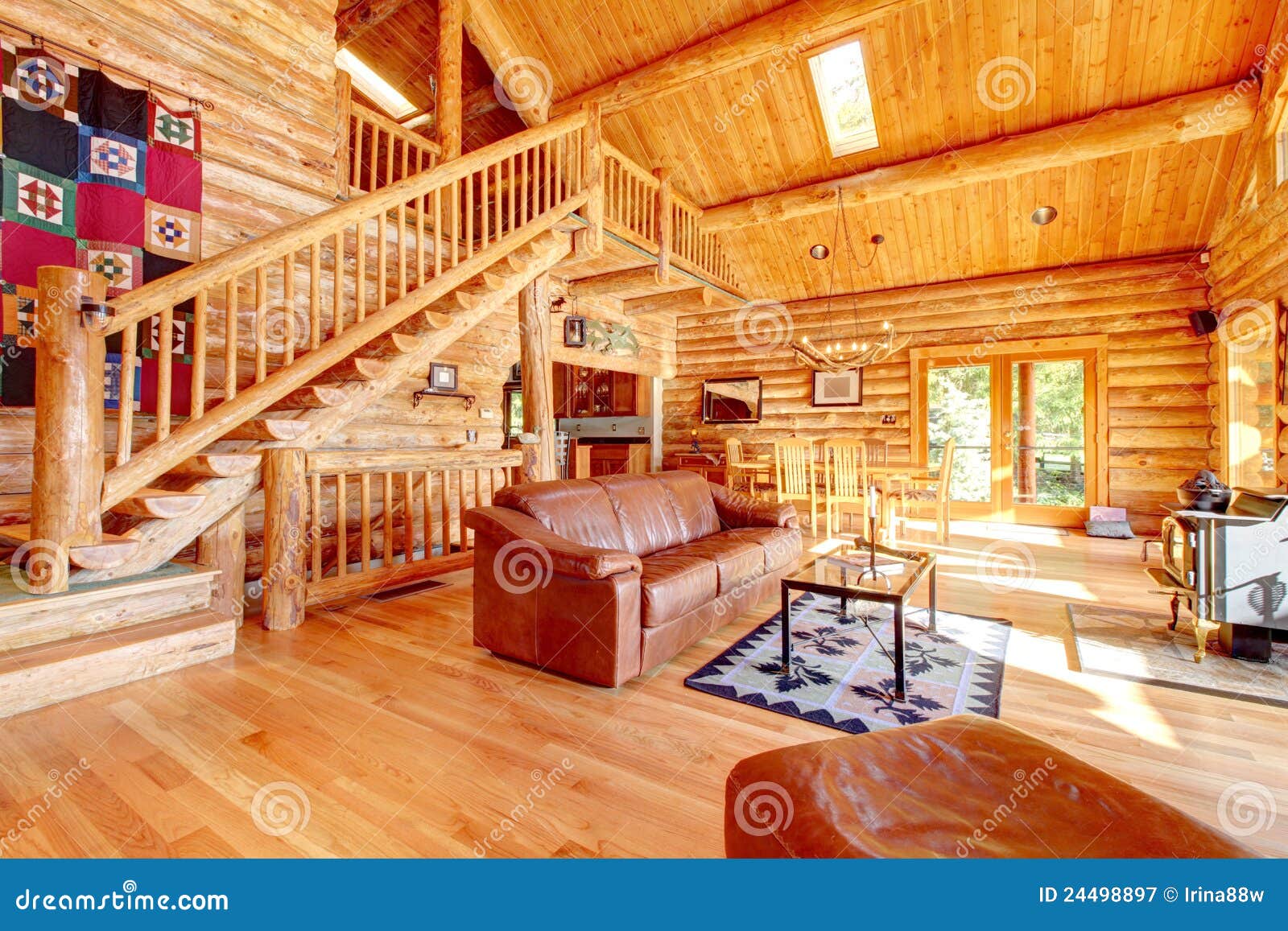 luxury log cabin living room with leather sofa.