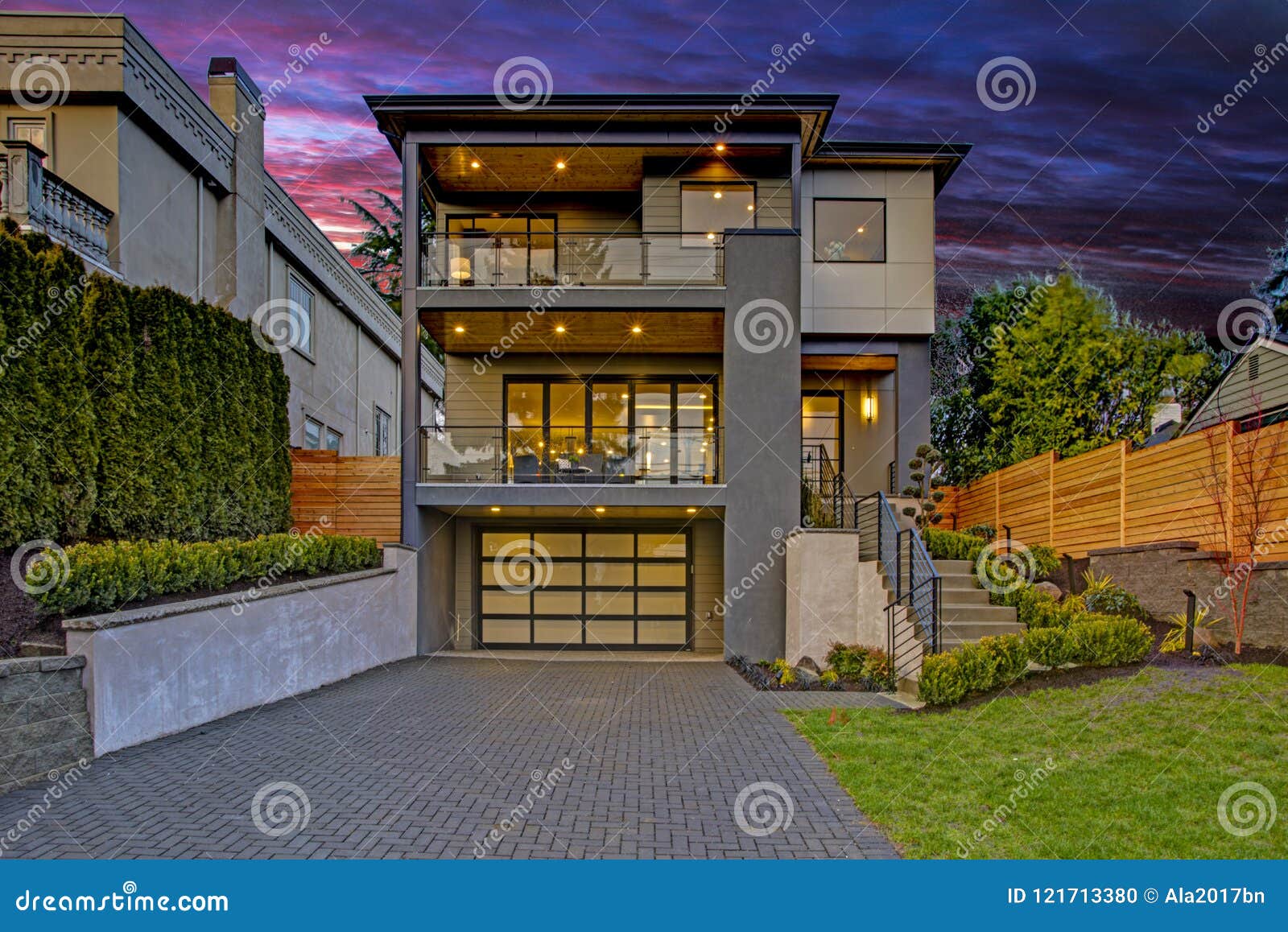 luxury modern home exterior at sunset