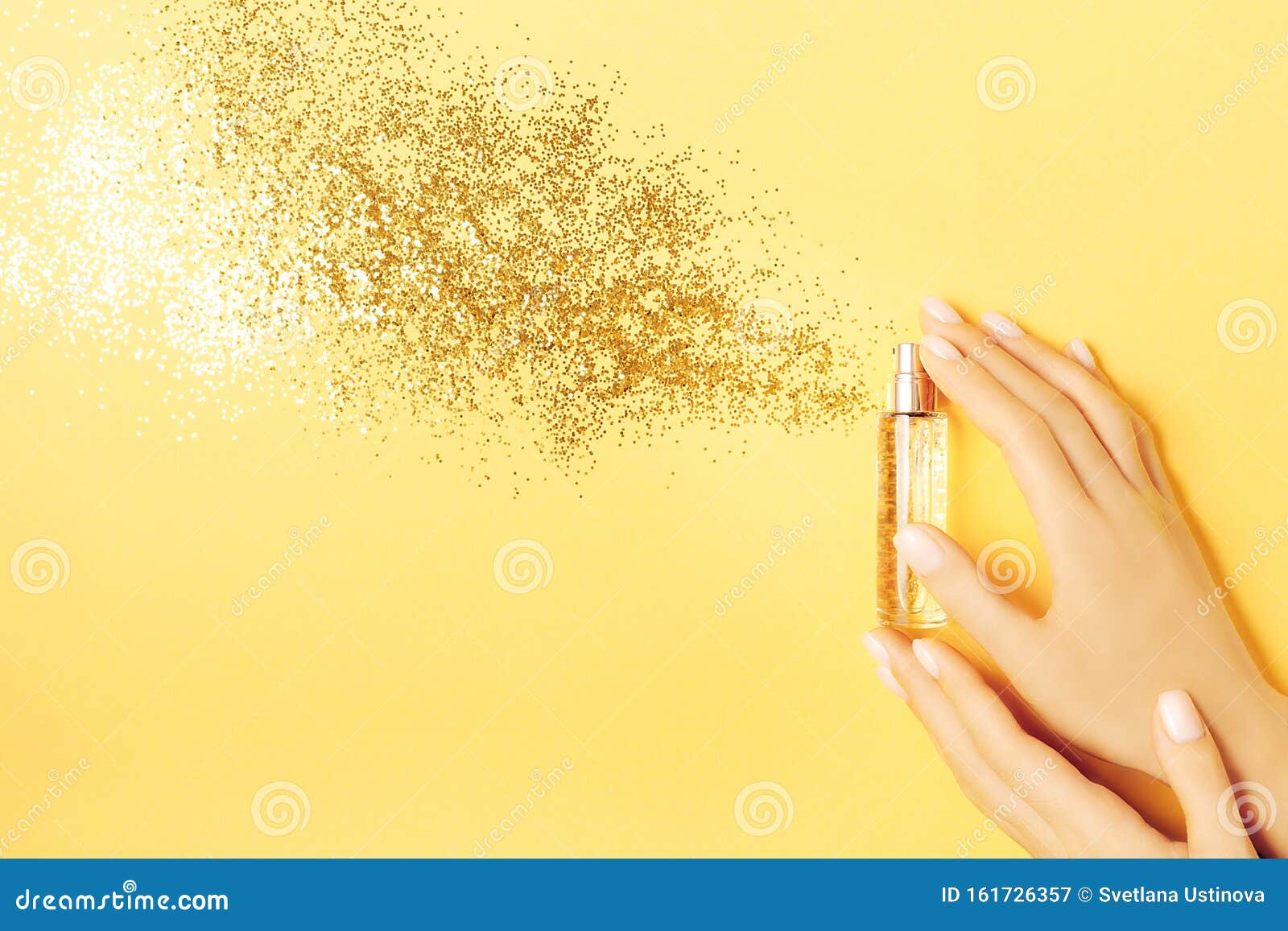 Luxury Perfume Concept. Female Hands Holding Stylish Bottle of Perfume with  Spray of Sparkles on Yellow Background Stock Image - Image of color,  feminine: 161726357