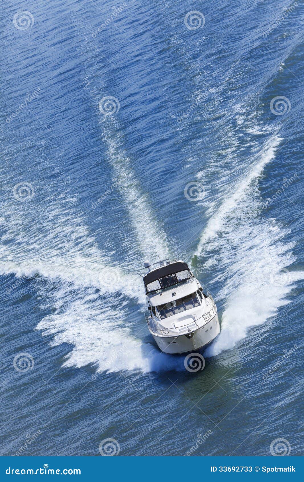 powerboat approaching large vessel