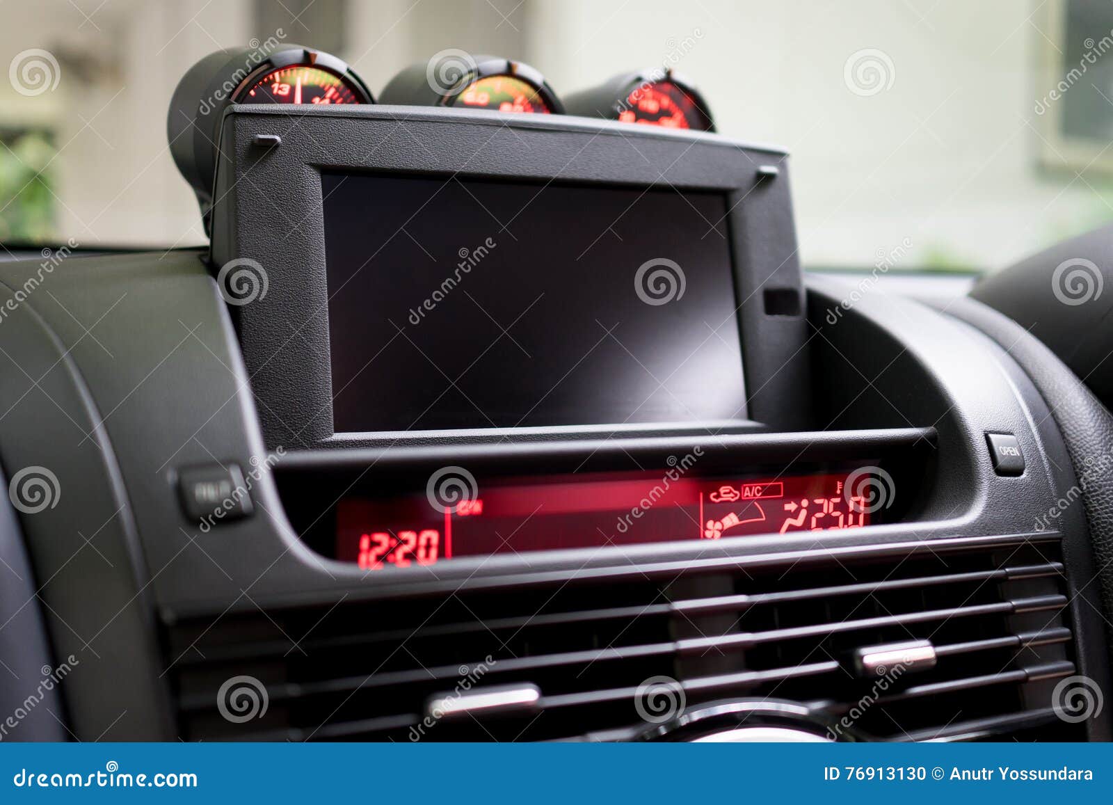 Luxury Sport Car Foldable TV Screen on Front Console. Stock Photo