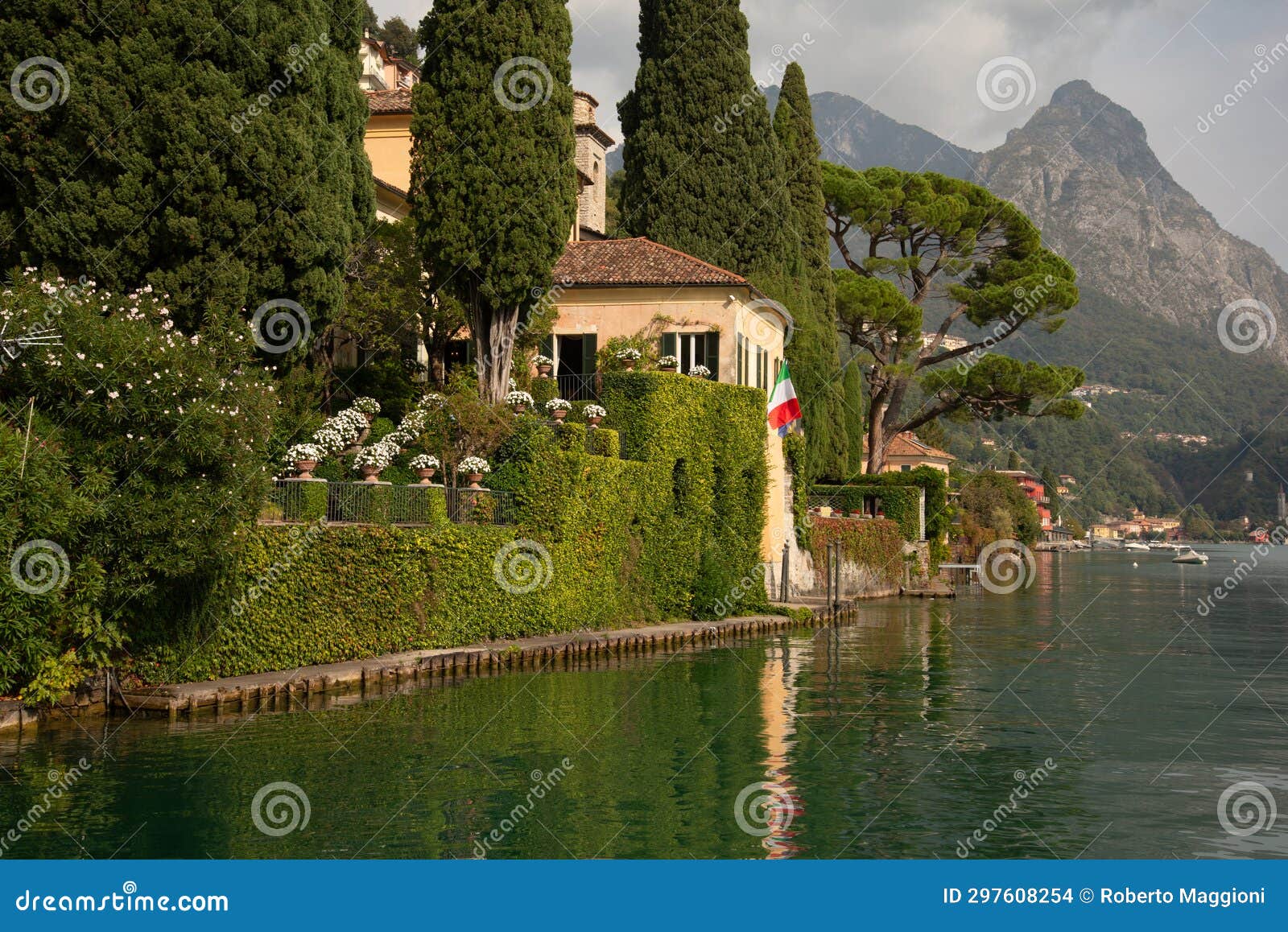 luxury villa lake - lago lugano, como, italy. historical villa and lakeside garden.