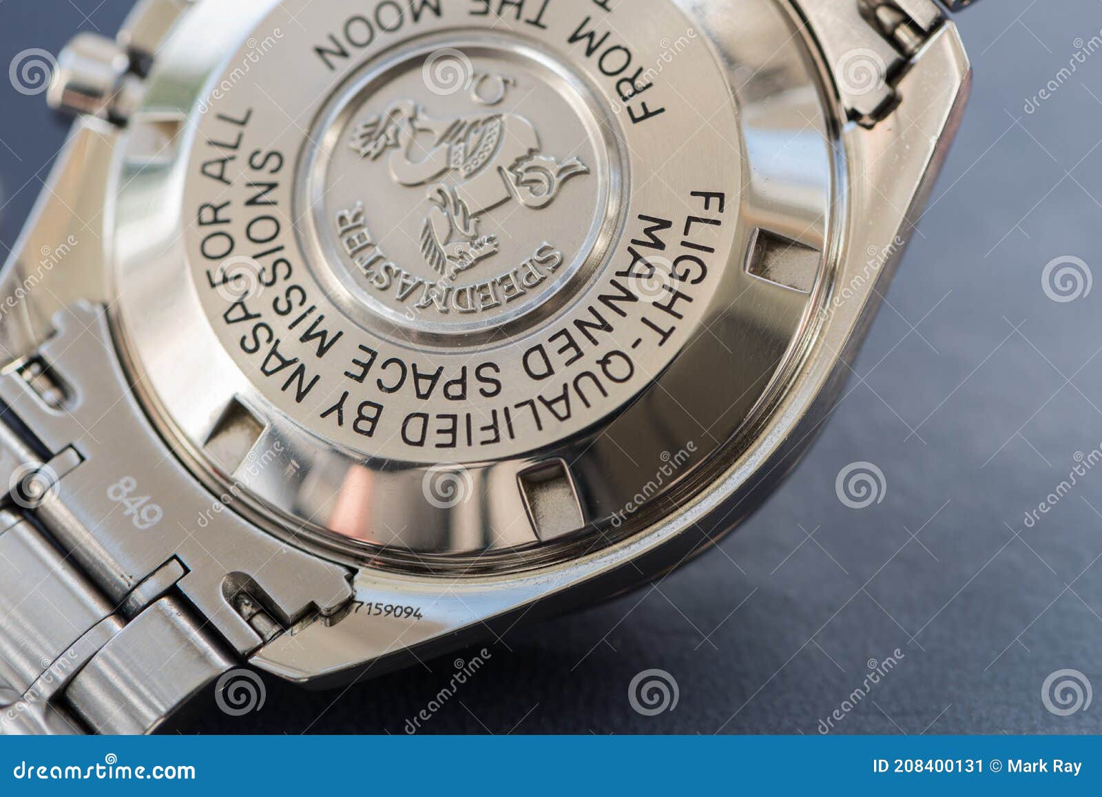 Luxury Watch Serial Number On An Omega Speedmaster Editorial Photo luxury-watch-serial-number-on-an-omega-speedmaster-editorial-photo