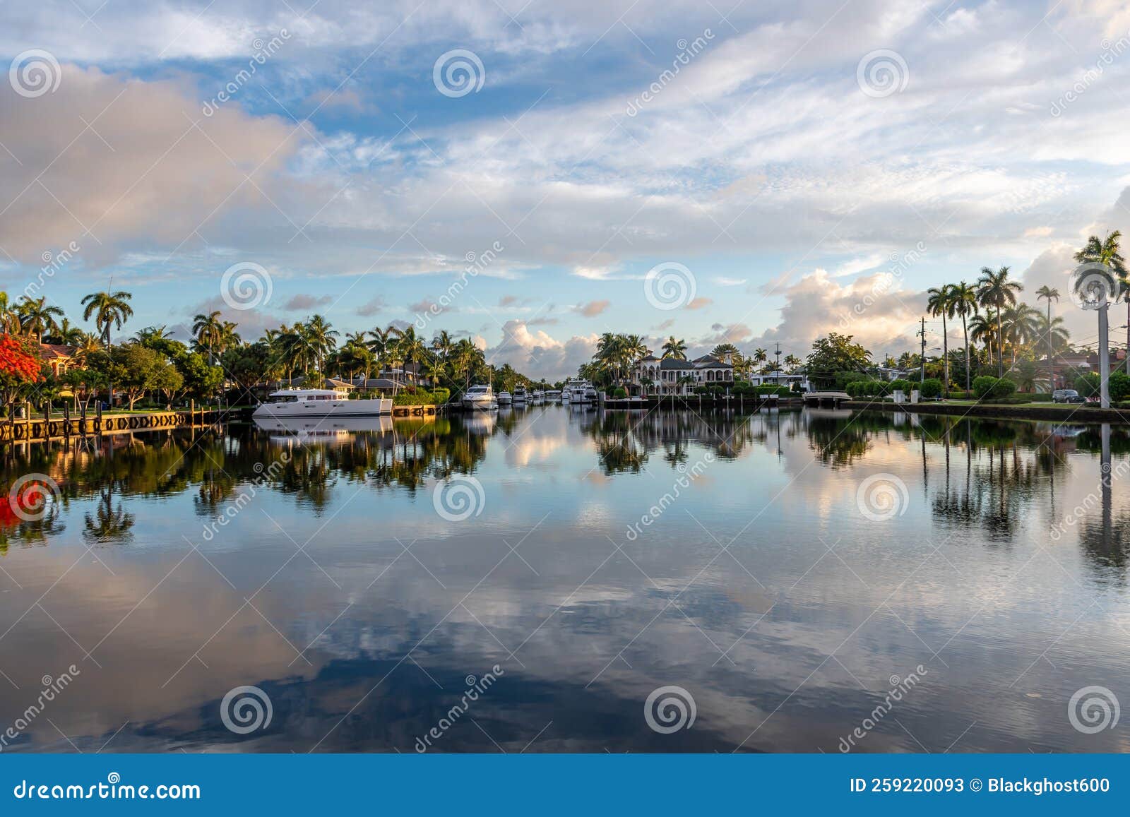 beautiful view of boats and luxury homes line the canals near las olas blvd. in fort lauderdale florida