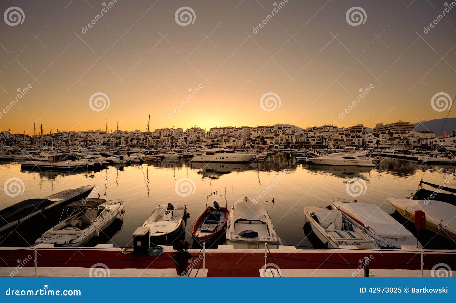 luxury yachts and motor boats moored in puerto banus marina in marbella, spain