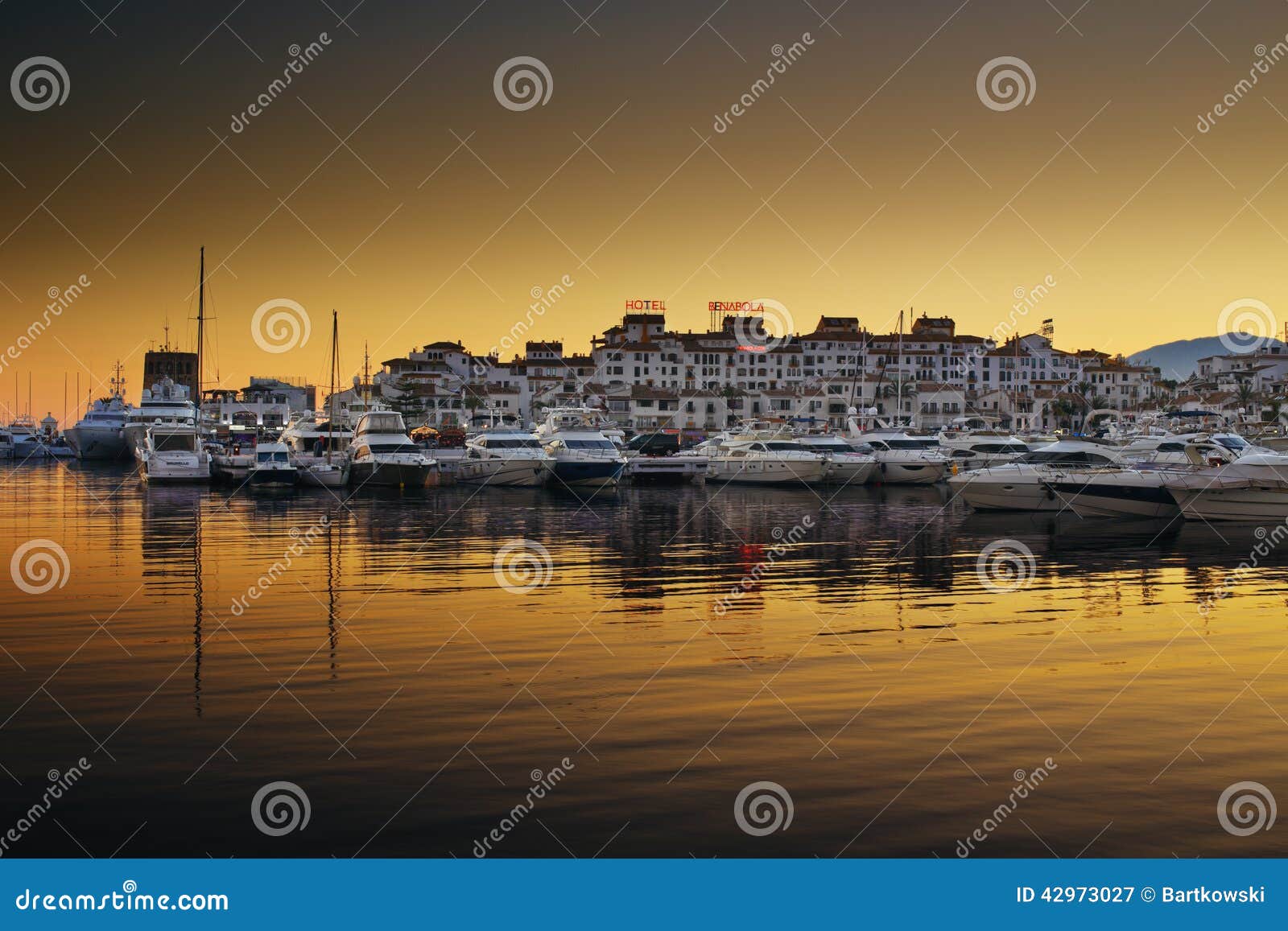 luxury yachts and motor boats moored in puerto banus marina in marbella, spain