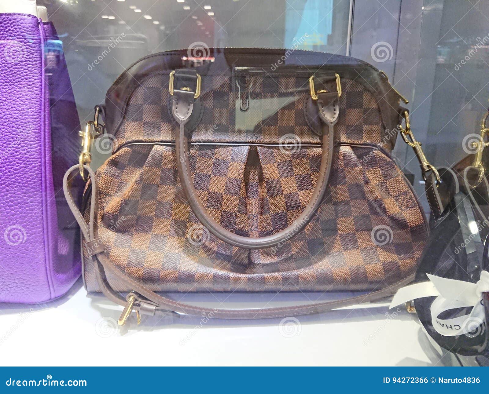 LV bags editorial photo. Image of goods, chanel, clothes - 94272366