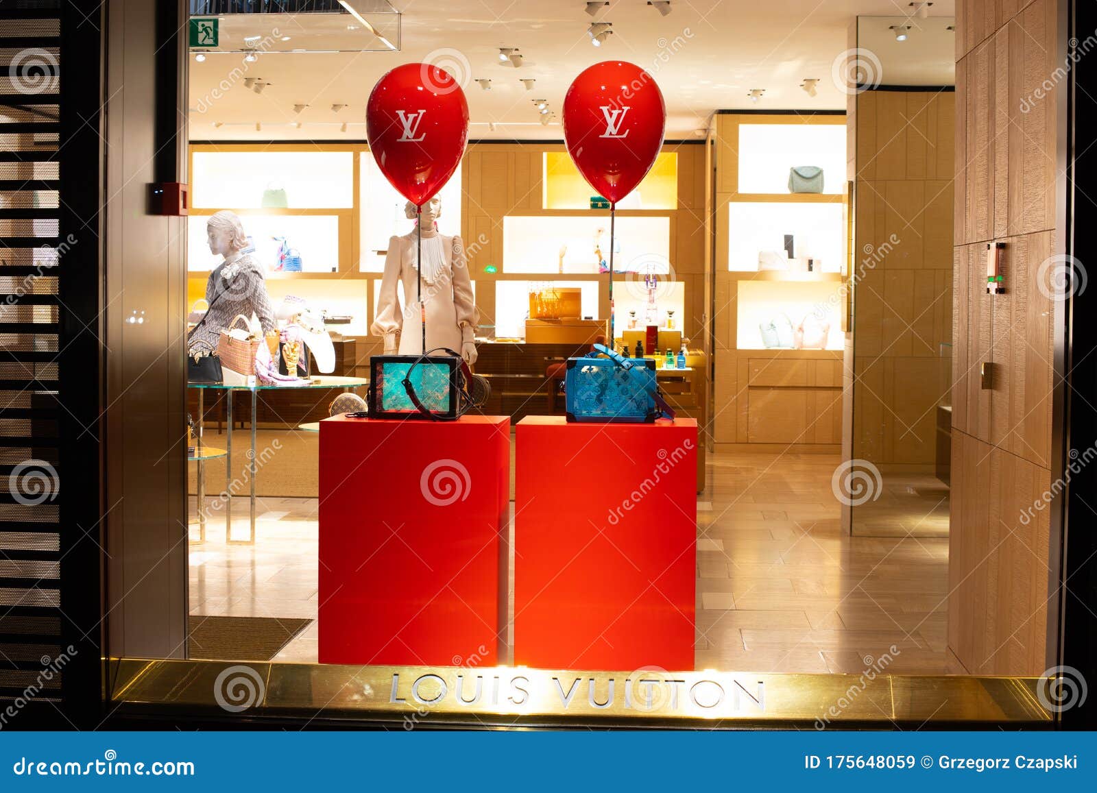 Louis Vuitton handbag store window shop front display in the