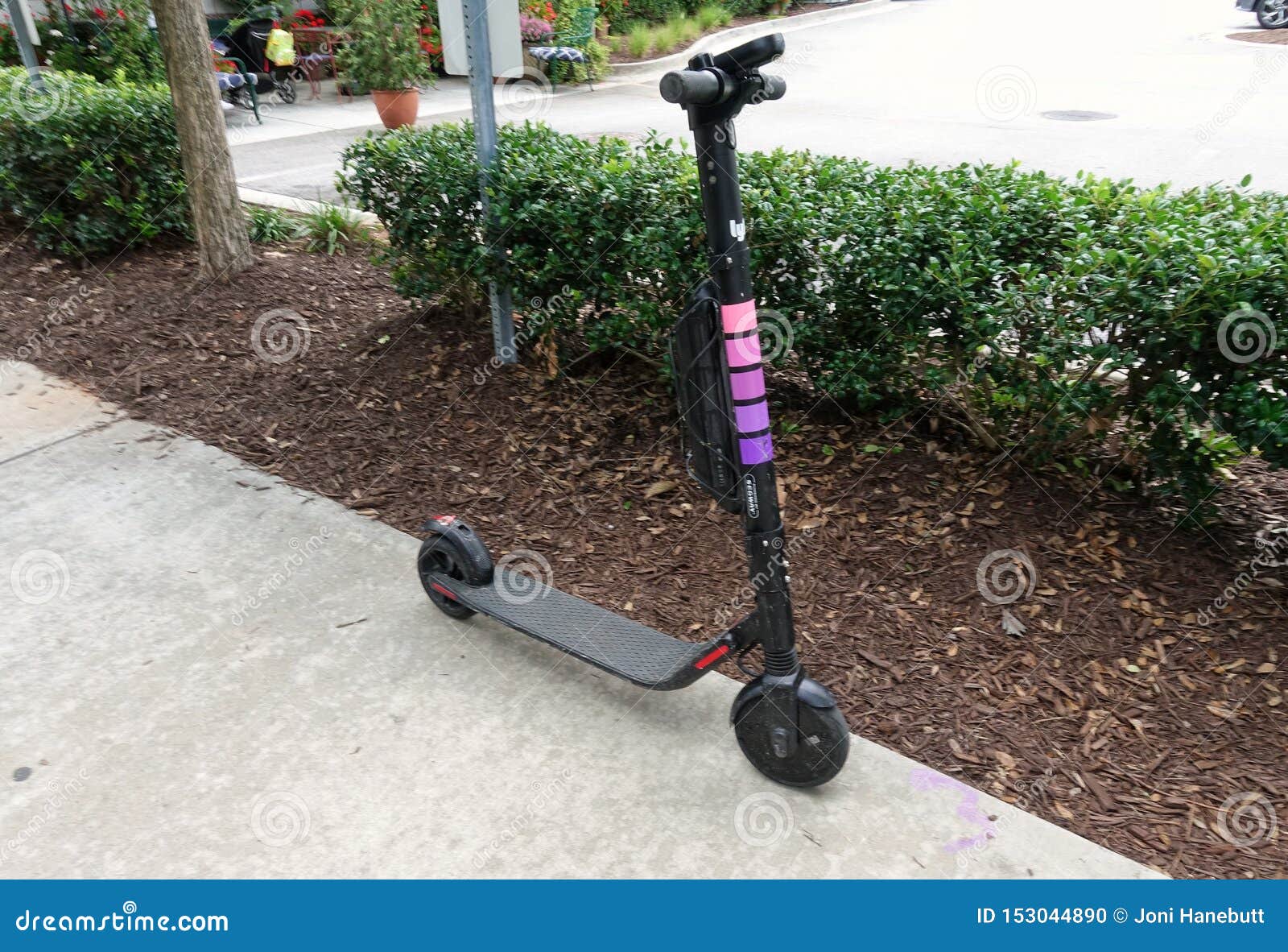 Lyft Ride Share Scooter On The Sidwalk Editorial Image ...