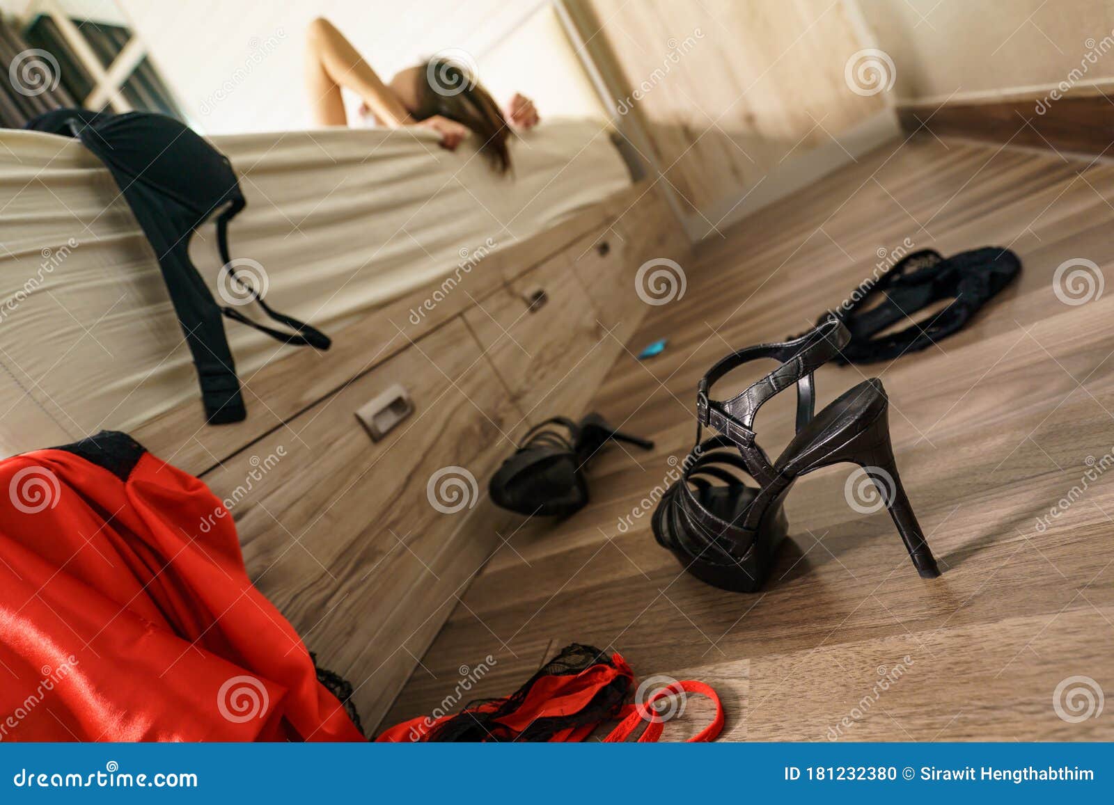 black lace underwear near condom, handcuffs and condom on bed Stock Photo  by LightFieldStudios