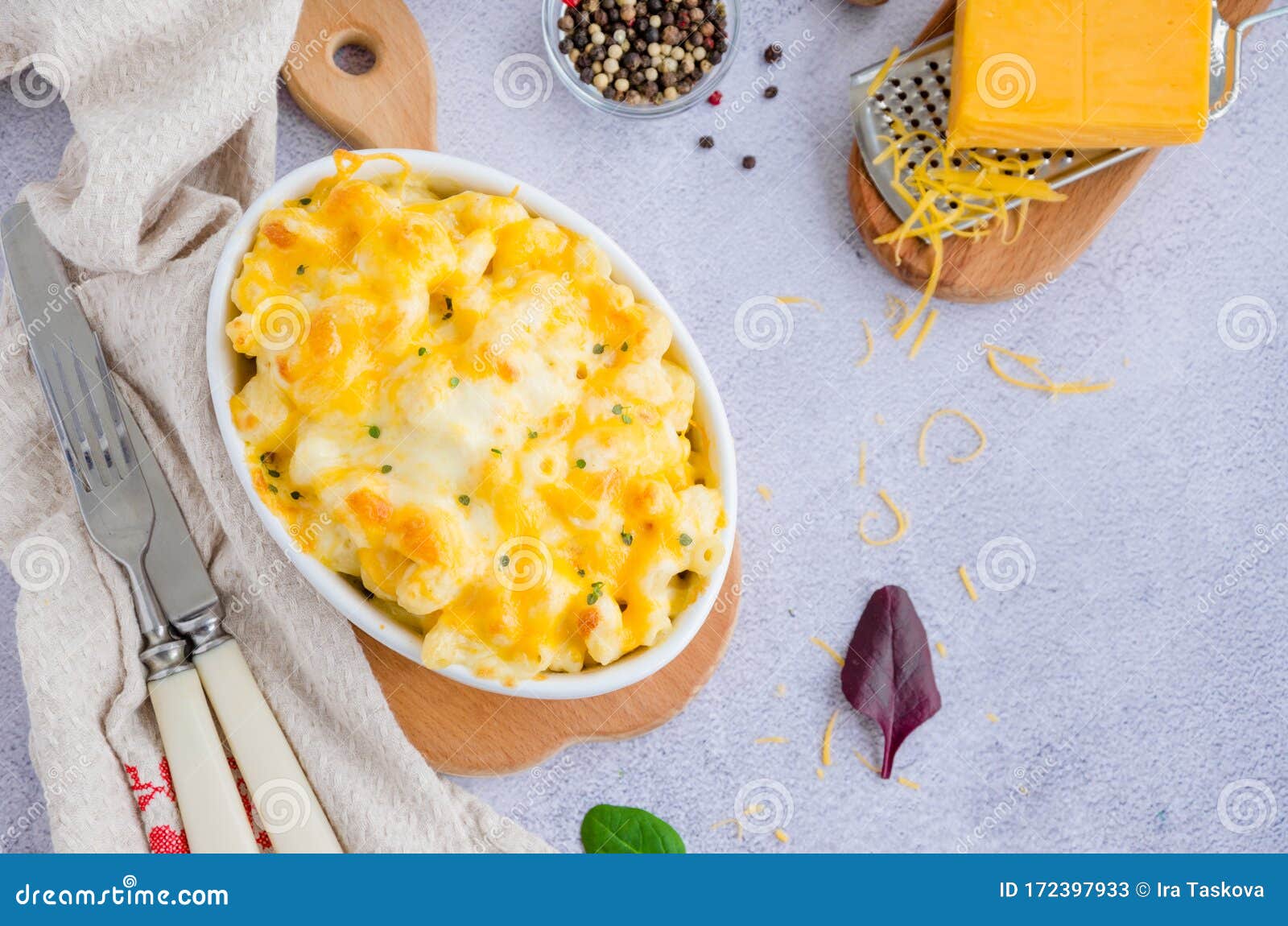 mac and cheese. traditional baked macaroni with cheese in baking form. american cuisine. horizontal orientation. top view.