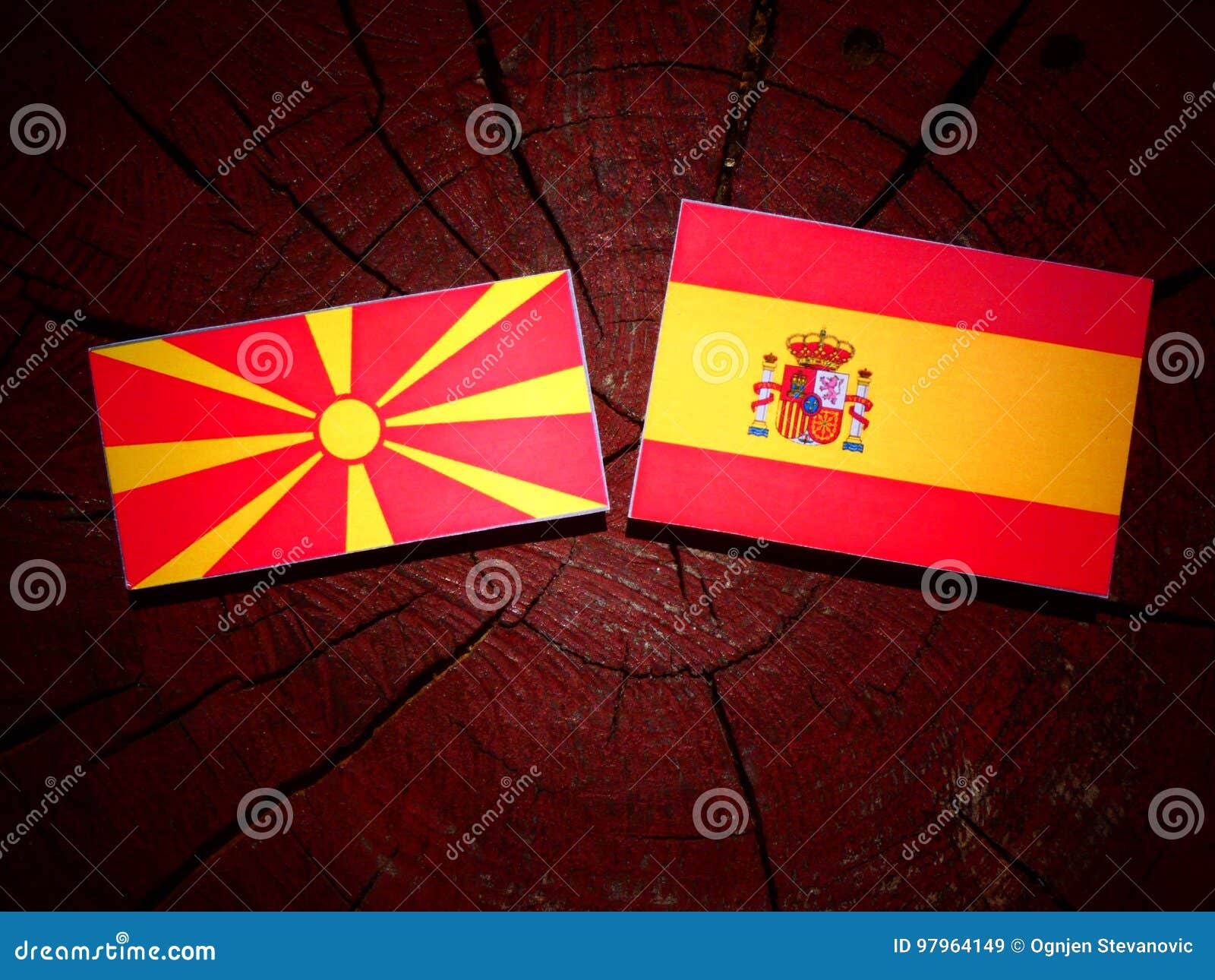 Macedonian Flag with Spanish Flag on a Tree Stump Stock Image Image