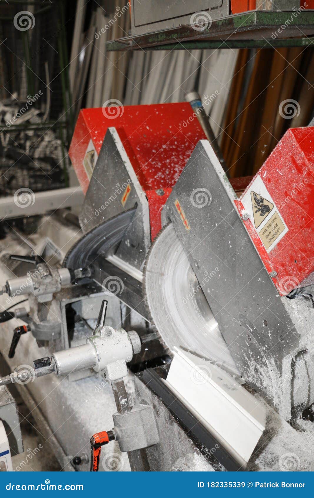 a machine  adjust a profile in a carpentry specializing in pvc