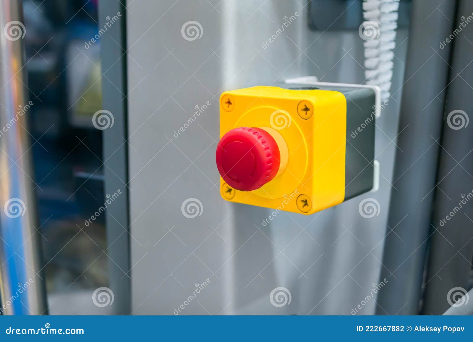 machine control panel with red switch button - emergency stop at factory