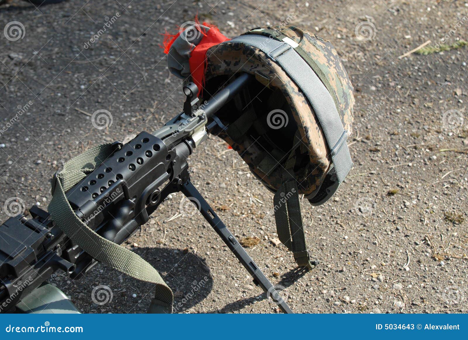 machine gun and helmet