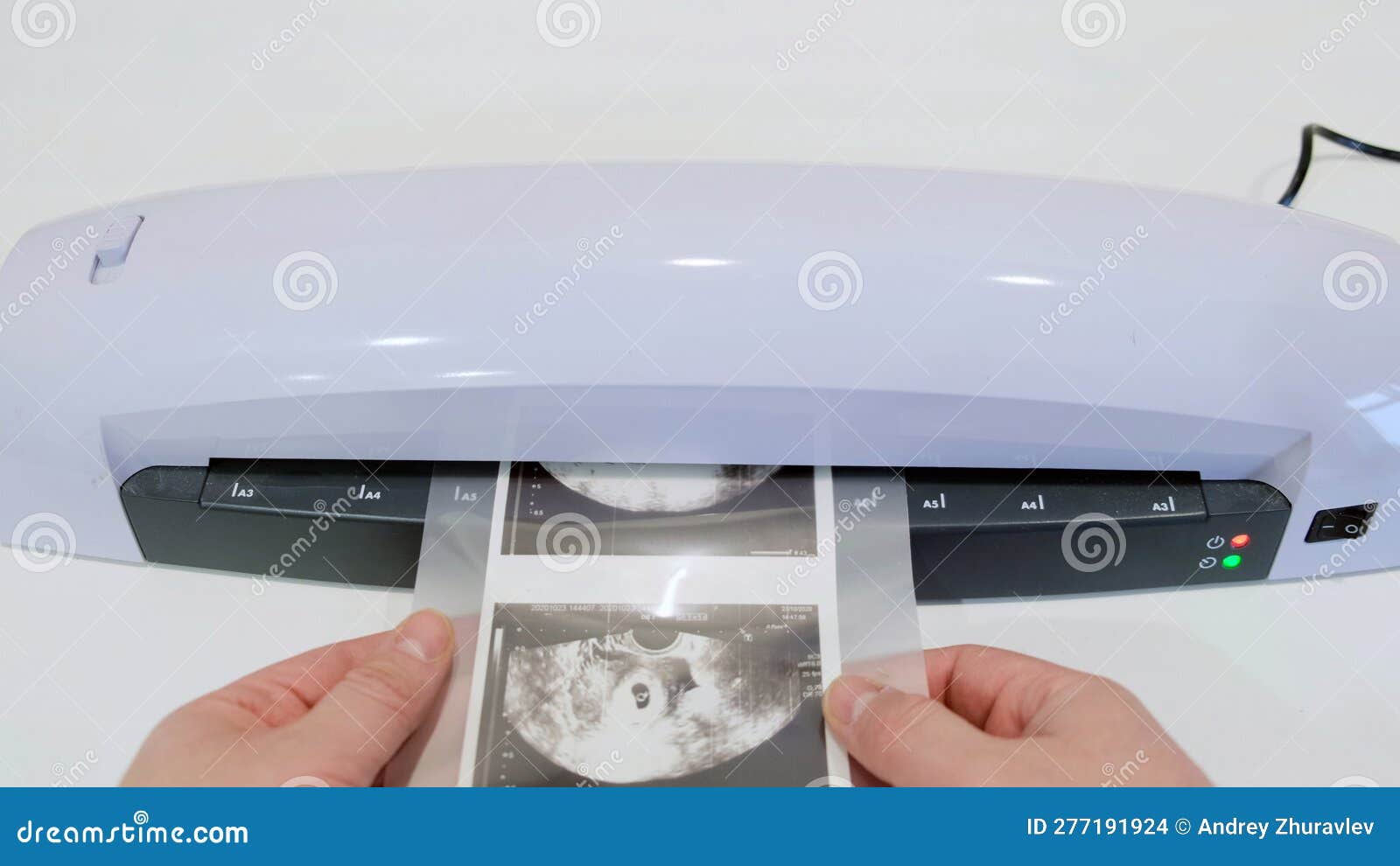 A Machine for Laminating Photos and Documents with Plastic. Desktop