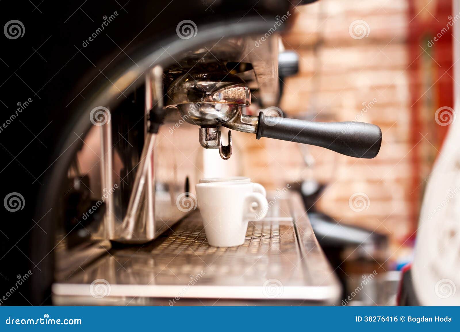 machine preparing espresso in coffee shop