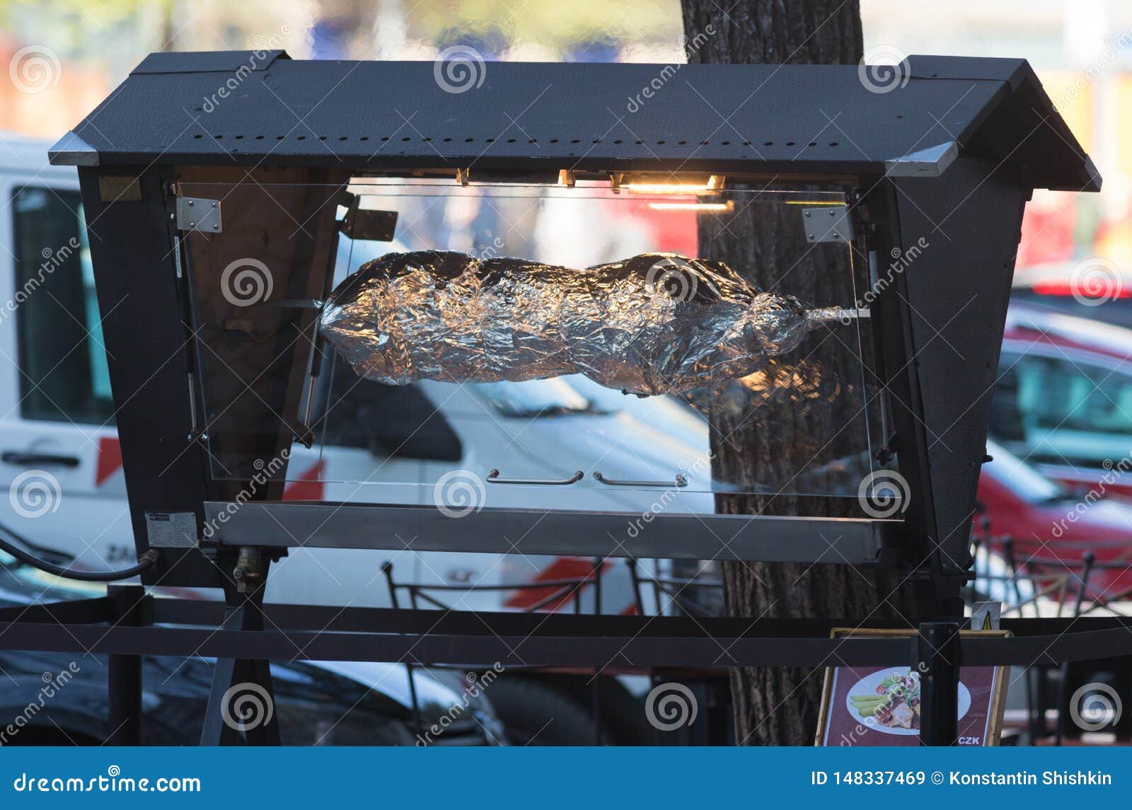 Machine Roasting Meat in Foil on the Street Stock Image Image of