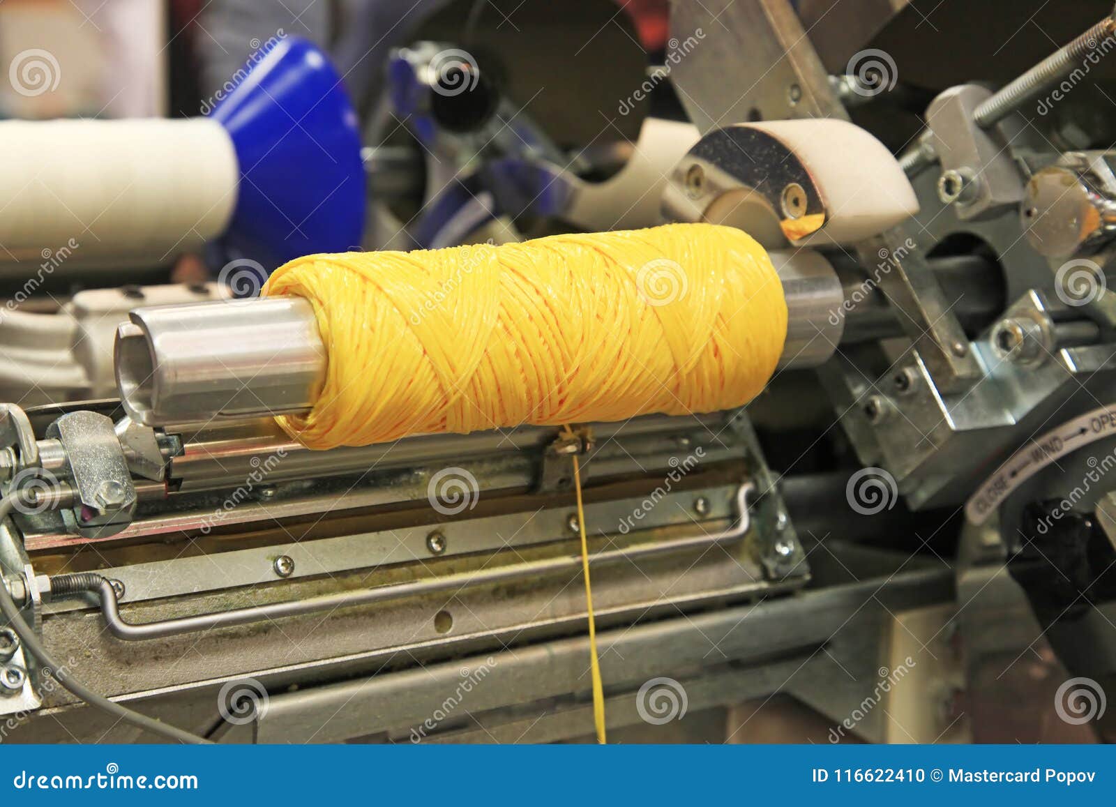 Textile industry equipment stock photo. Image of yellow 116622410