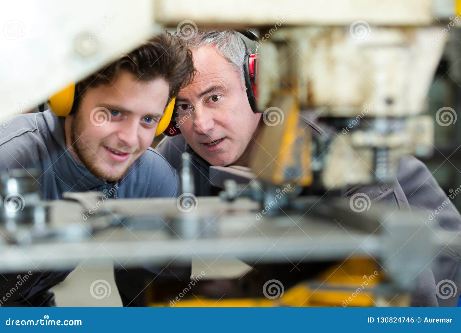 machinist-and-his-apprentice-stock-photo-image-of-earmuffs-educate-130824746