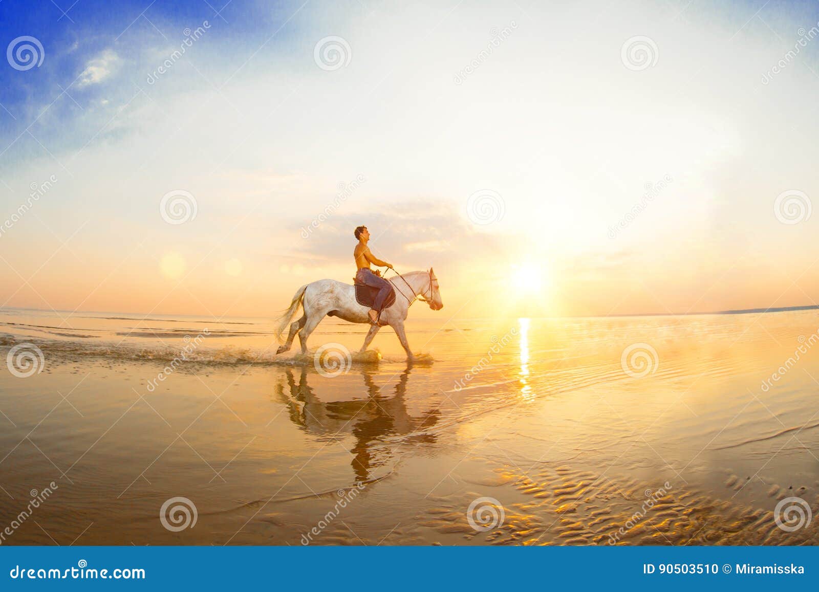 macho man and horse on the background of sky and water. boy mode
