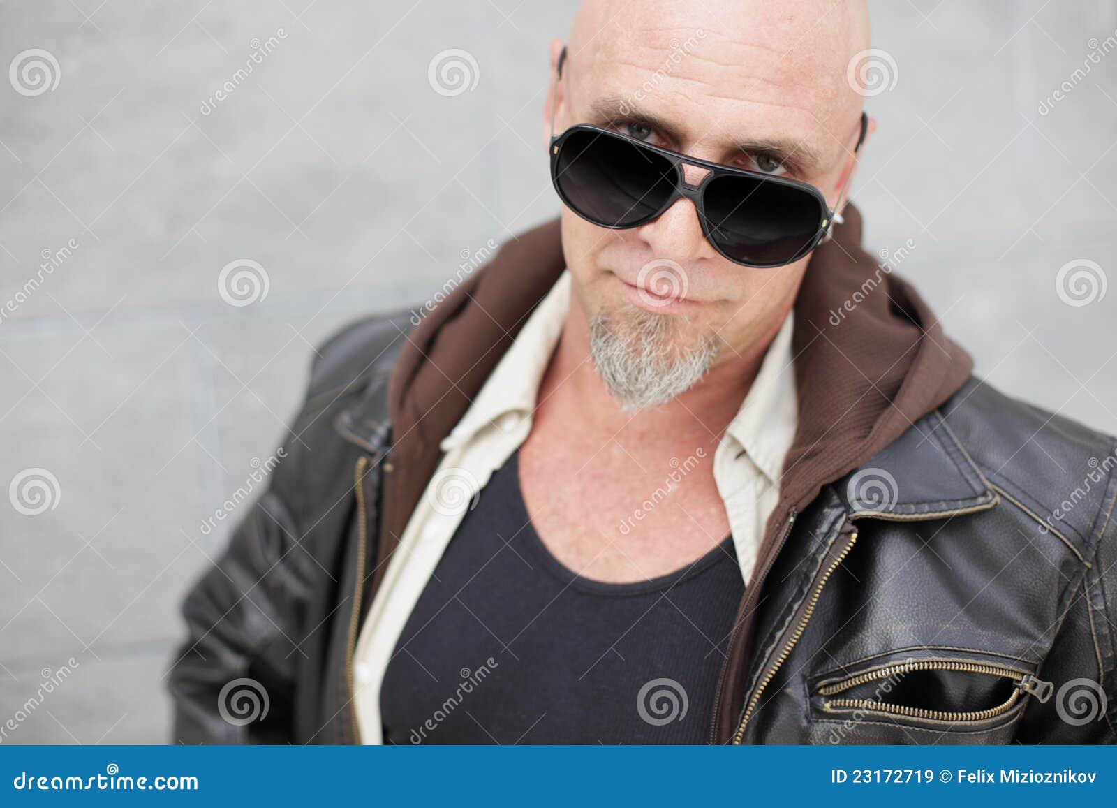 Macho man with sunglasses stock image. Image of looking 23172719