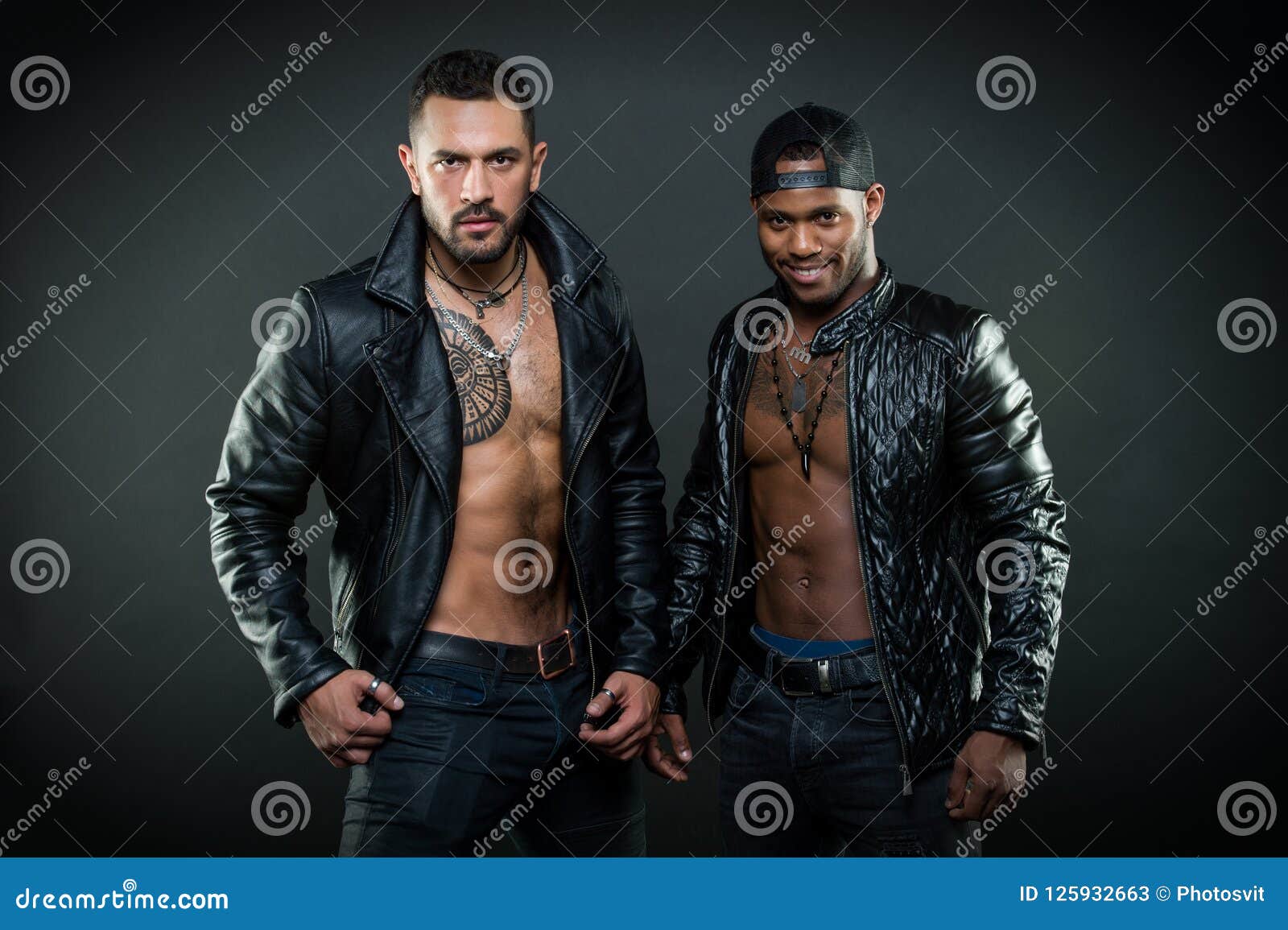 machos with muscular torsos look attractive in leather jackets, dark background. masculinity and brutality concept. men