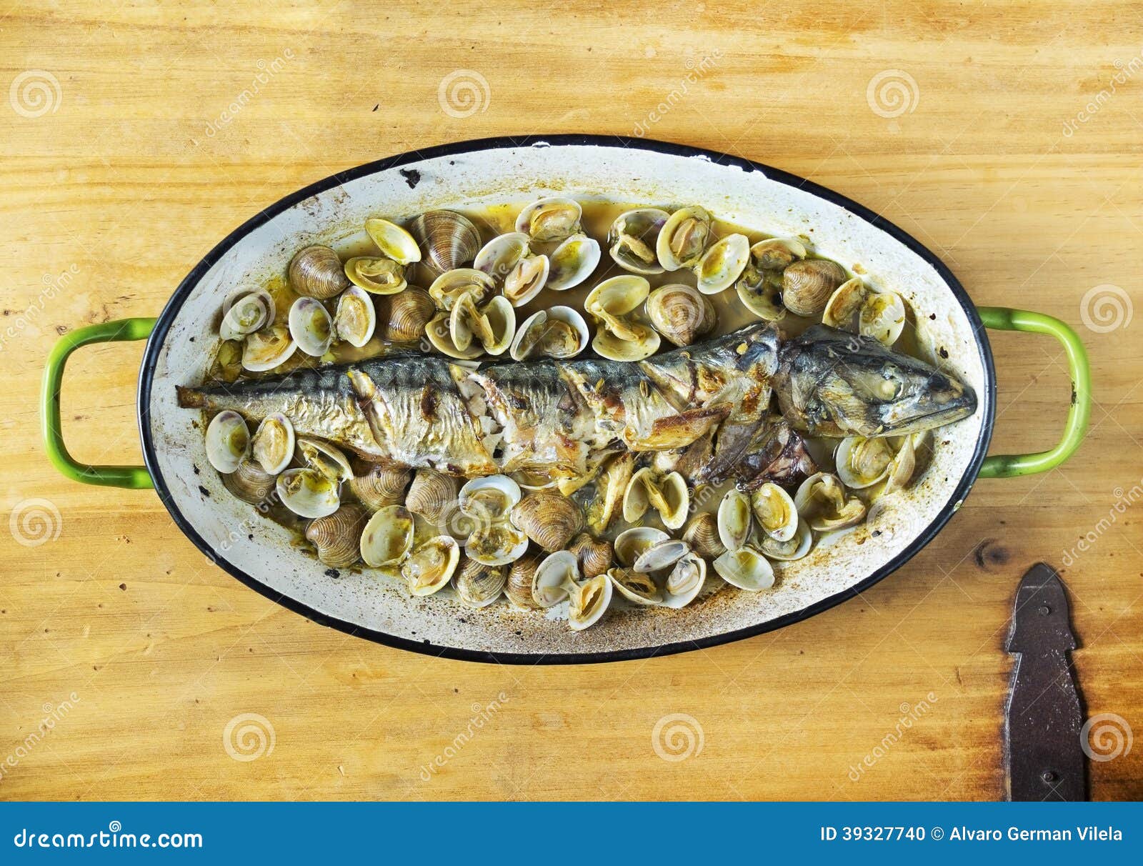 Mackerel baked with clams. stock photo. Image of meal 39327740