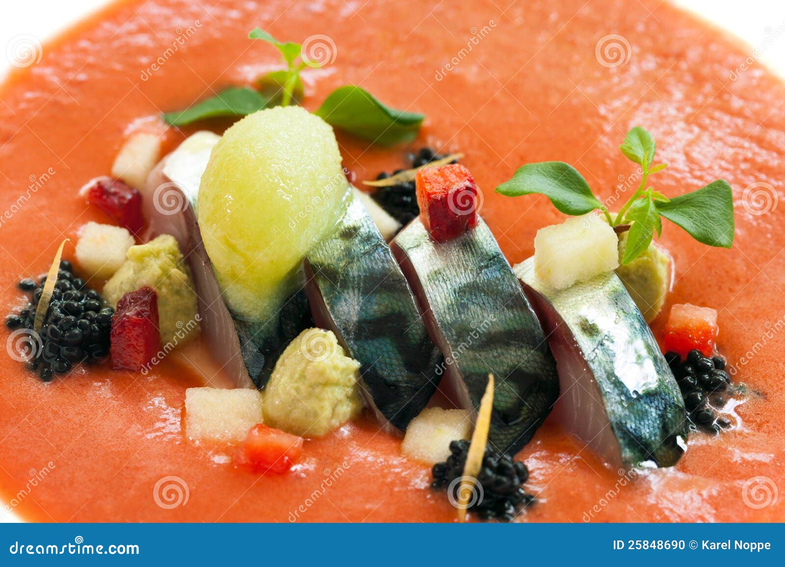 mackerel fish with orange seafood dressing.