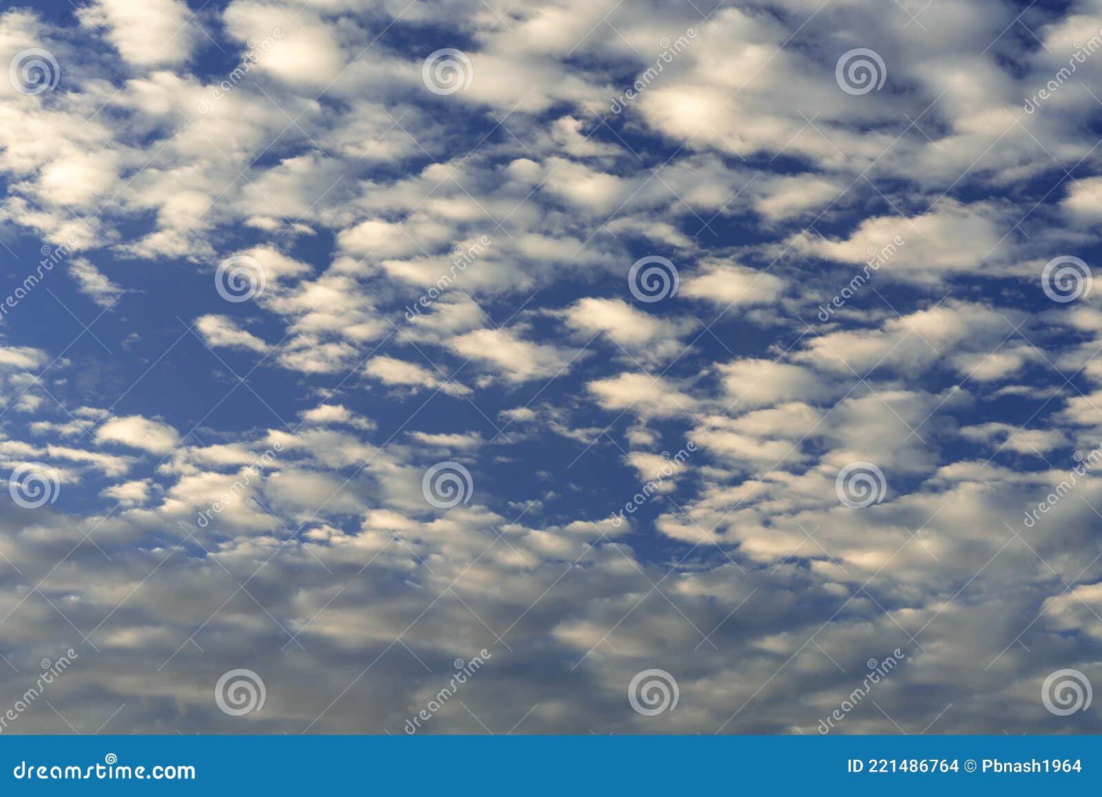 Mackerel Sky Blue with White Puffy Clouds Background Stock Photo