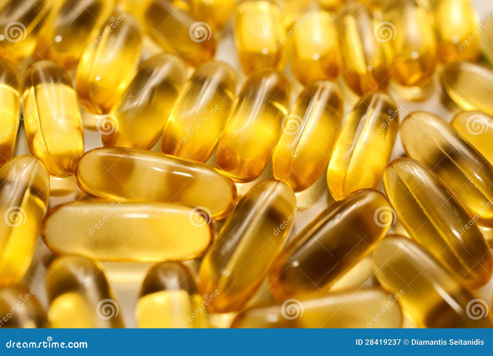Macro of a Bunch of Yellow Gel Pills. Stock Image Image of healthy