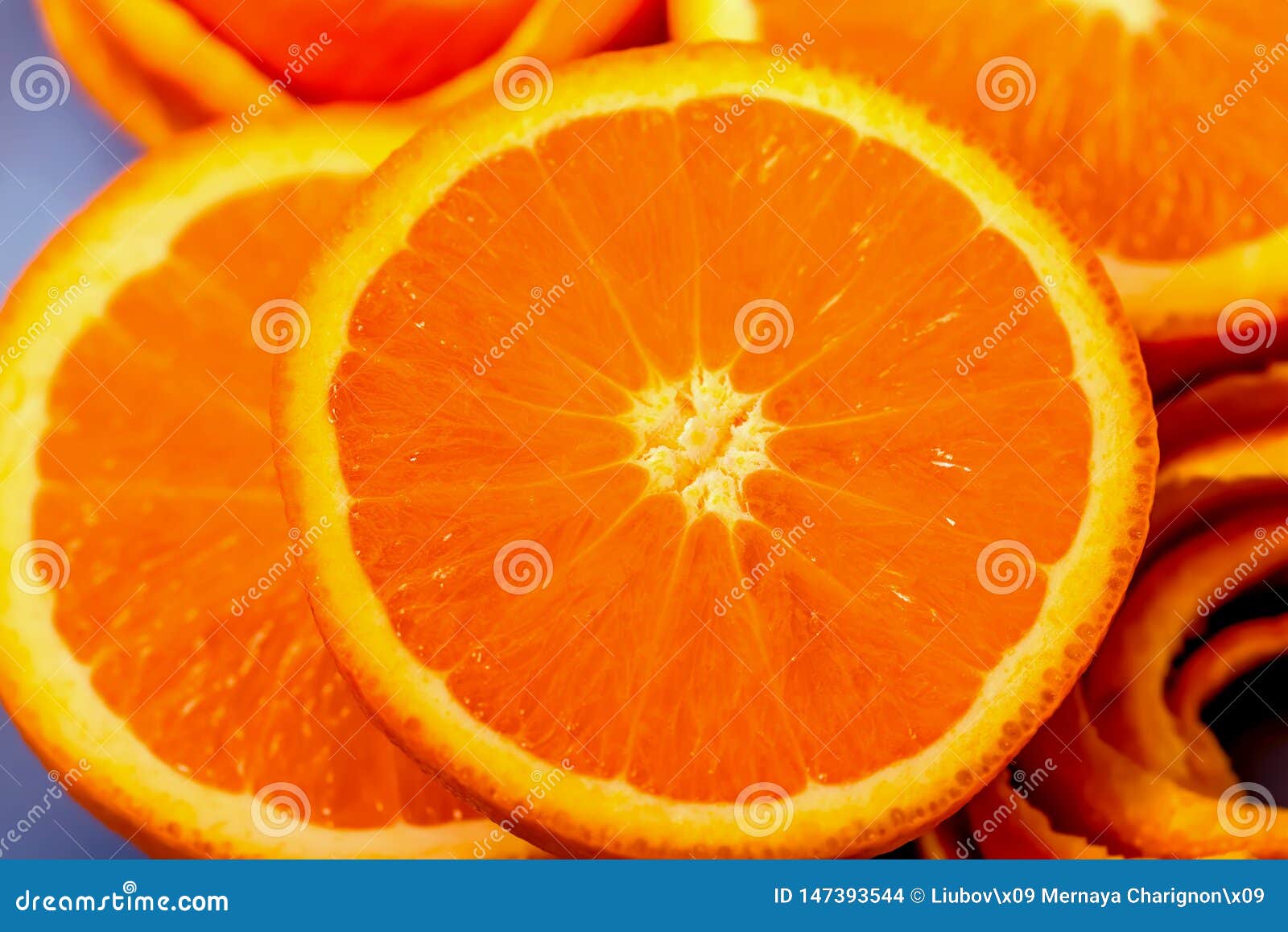 macro citrus fruit. background with slice a tangerine. art image with a half mandarin.