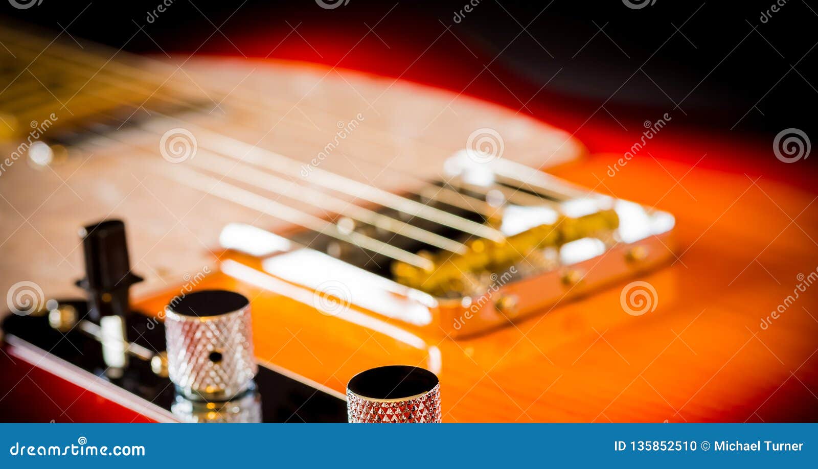 Close Up of a Electric Guitar Volume and Tone Knobs Stock Photo Image