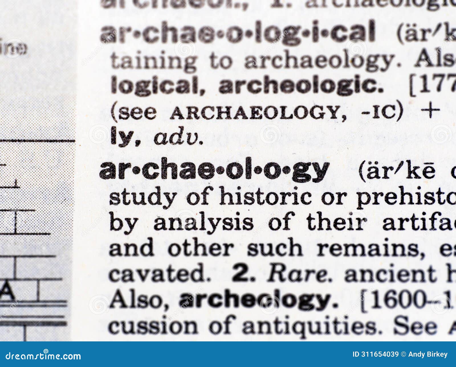 closeup of the word archaeology in the dictionary