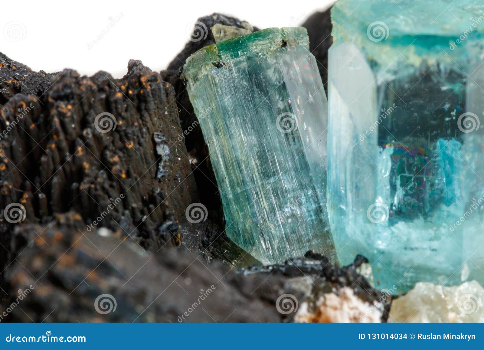 macro mineral stone aquamarine and black tourmaline, schorl on a