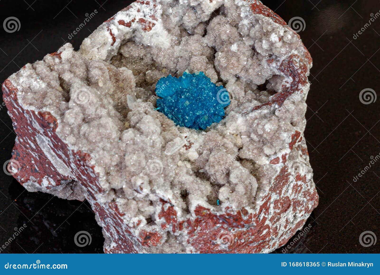macro mineral stone cavansite on a gray background
