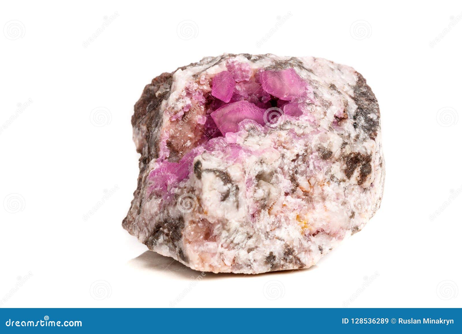 macro mineral stone cobalt calcite rock on white background