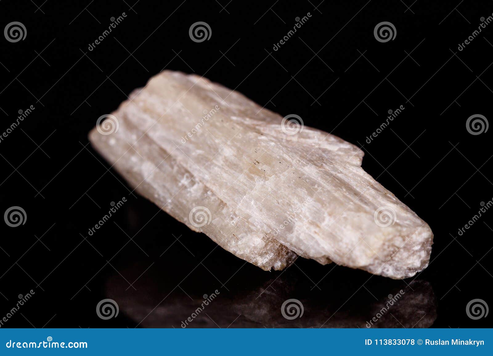 macro mineral stone orthoclase on black background