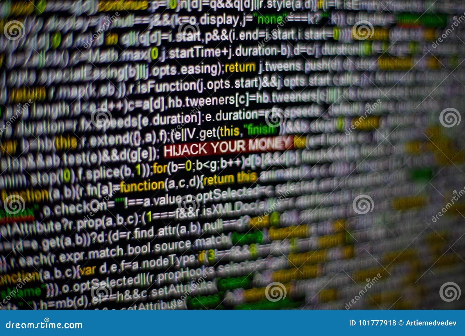 macro photo of computer screen with program source code and highlighted hijack your money inscription in the middle