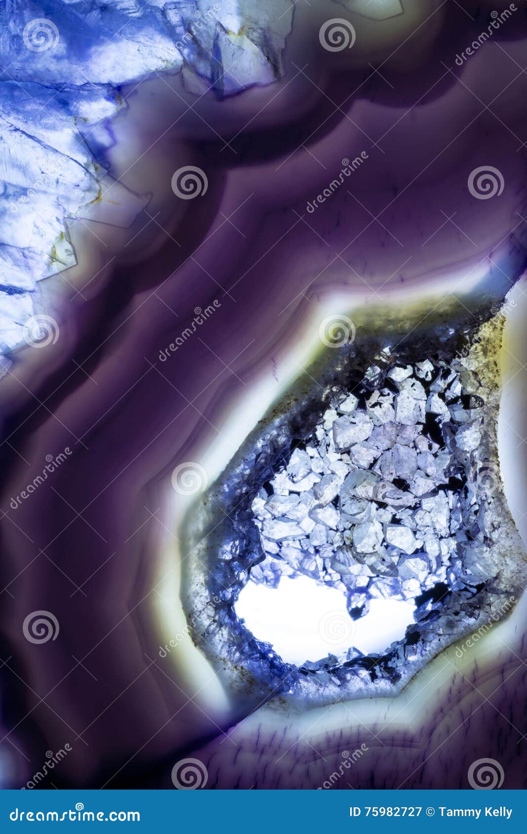 macro photo of a purple agate rock slice.