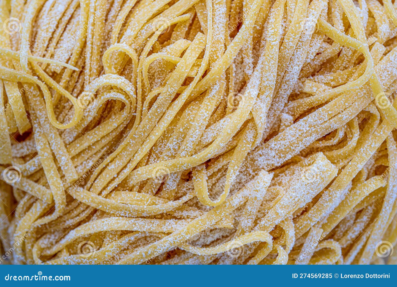 Macro Photograph of Raw Italian Egg Noodle Taglietelle Pasta from Above