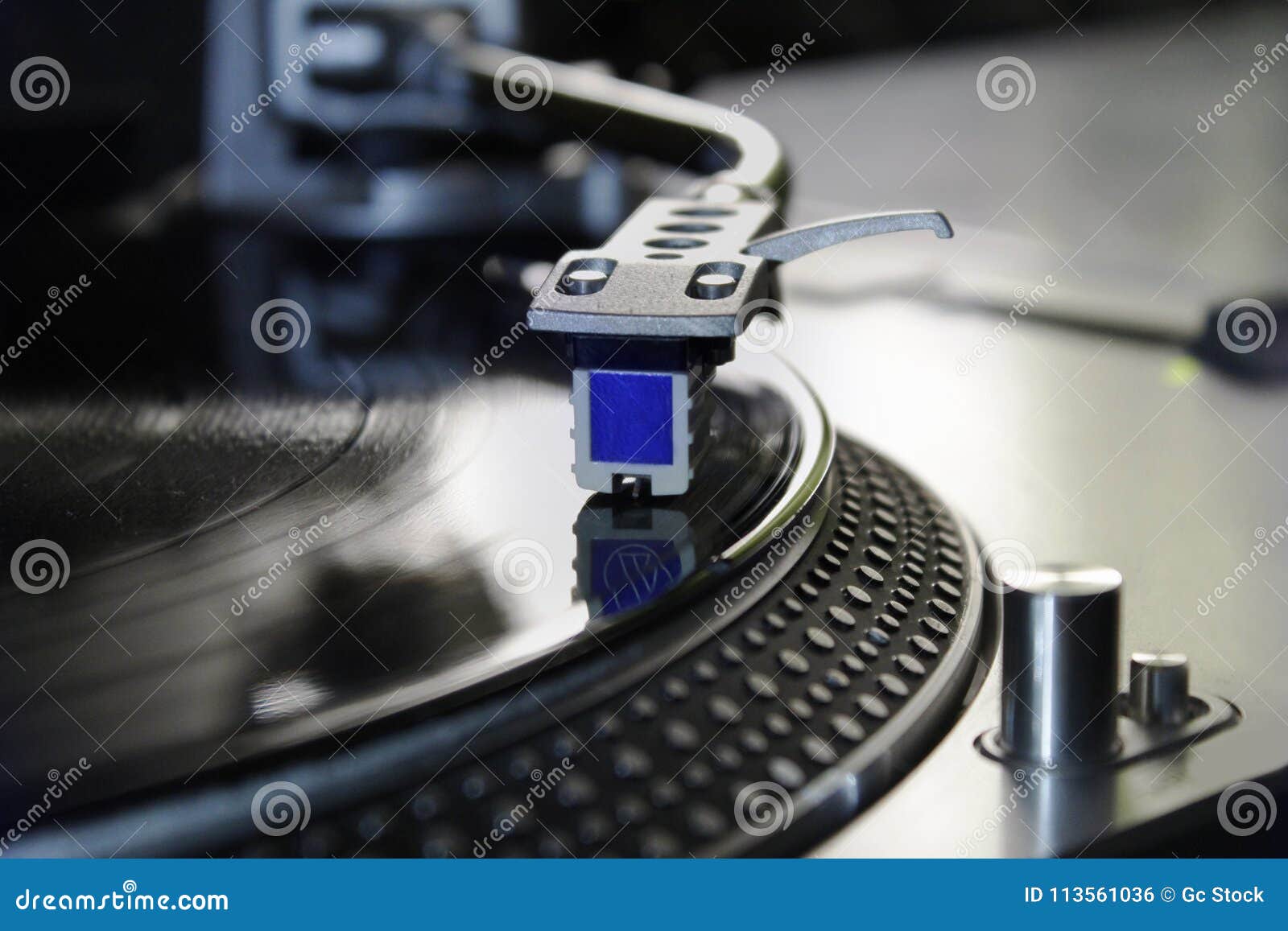 macro of a professional dj record player. concept: music, dj, hobby, passion