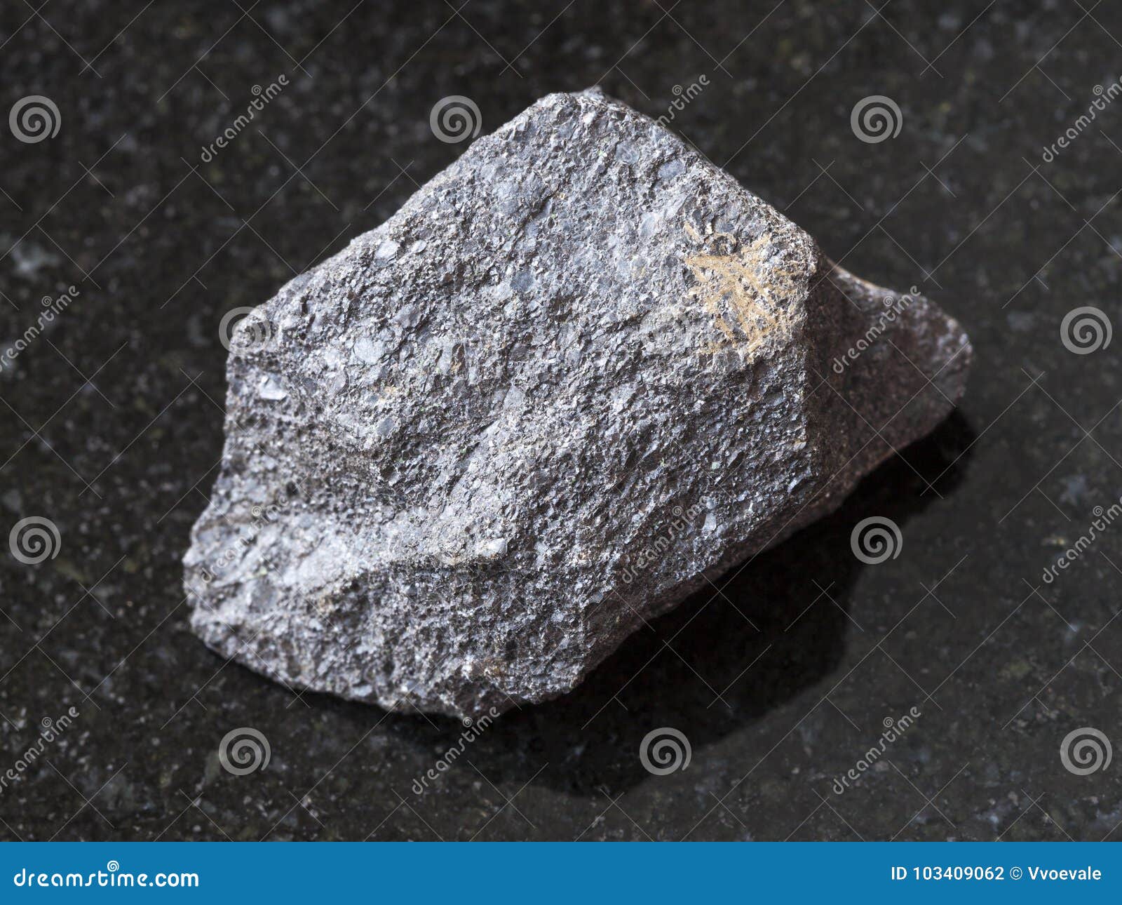 raw chromite stone on dark background
